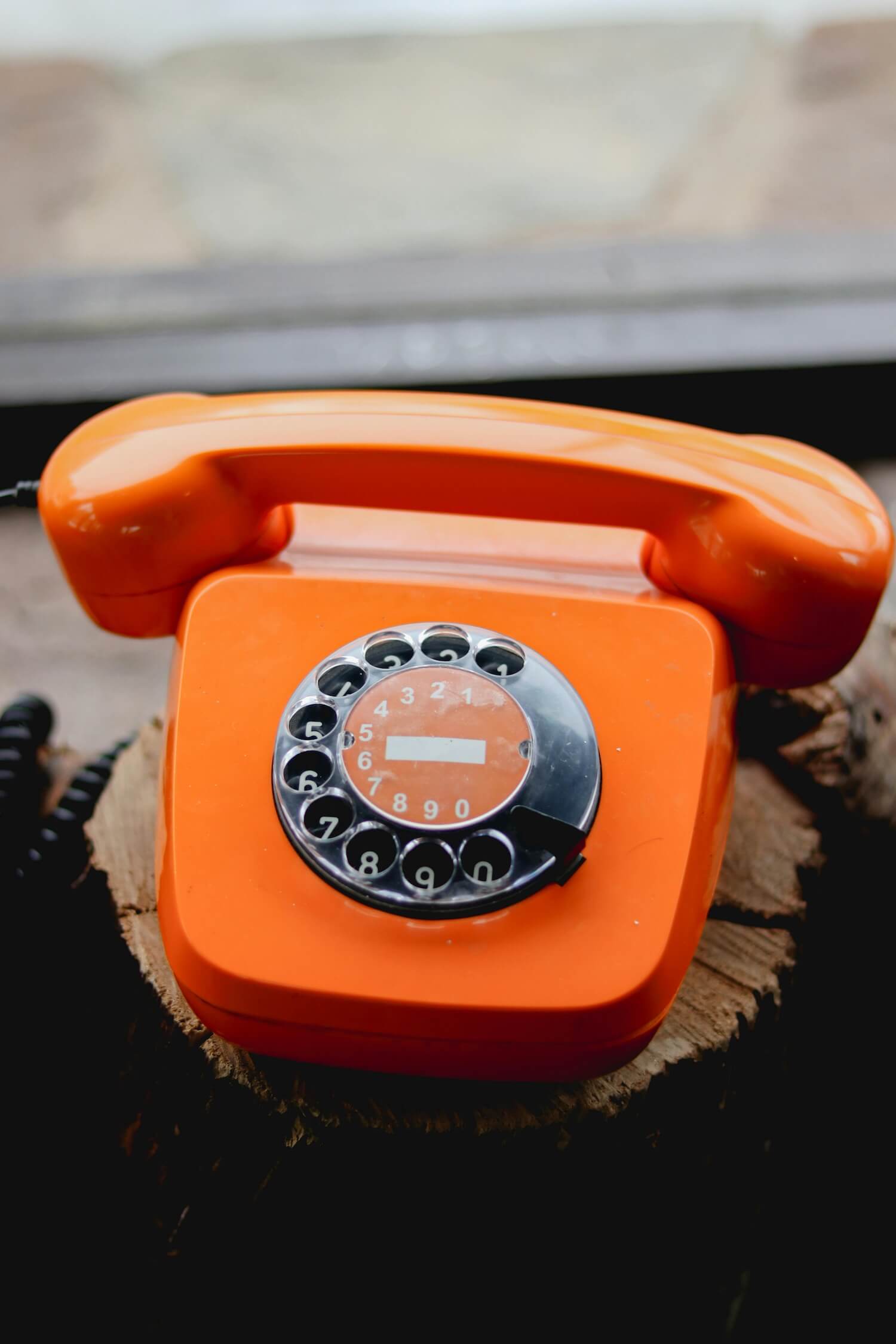Bright orange rotary phone